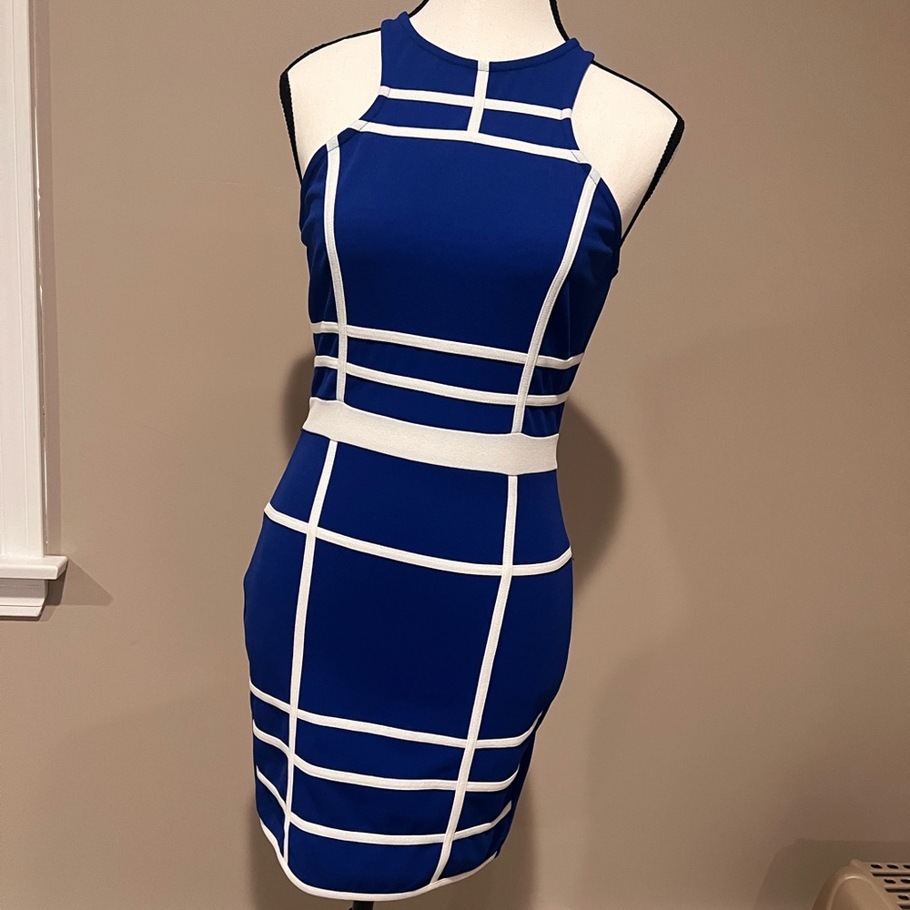 Royal blue dress with white stripes.